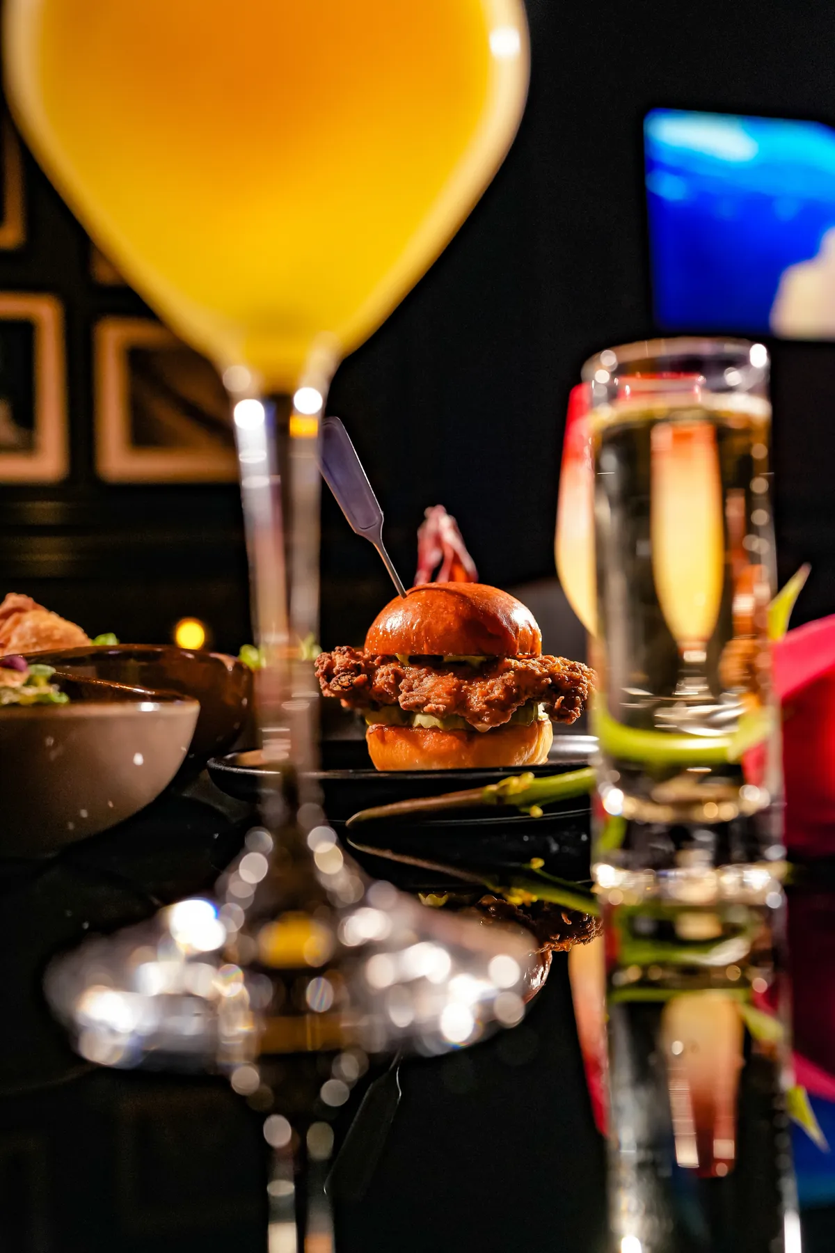 Fried chicken slider with a cocktail at Bond
