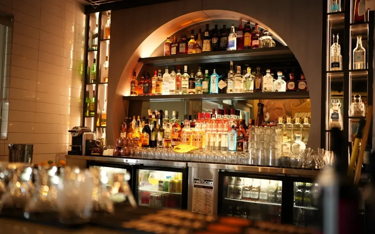 Mikhuna's arched back bar stocked with pisco and Japanese whisky