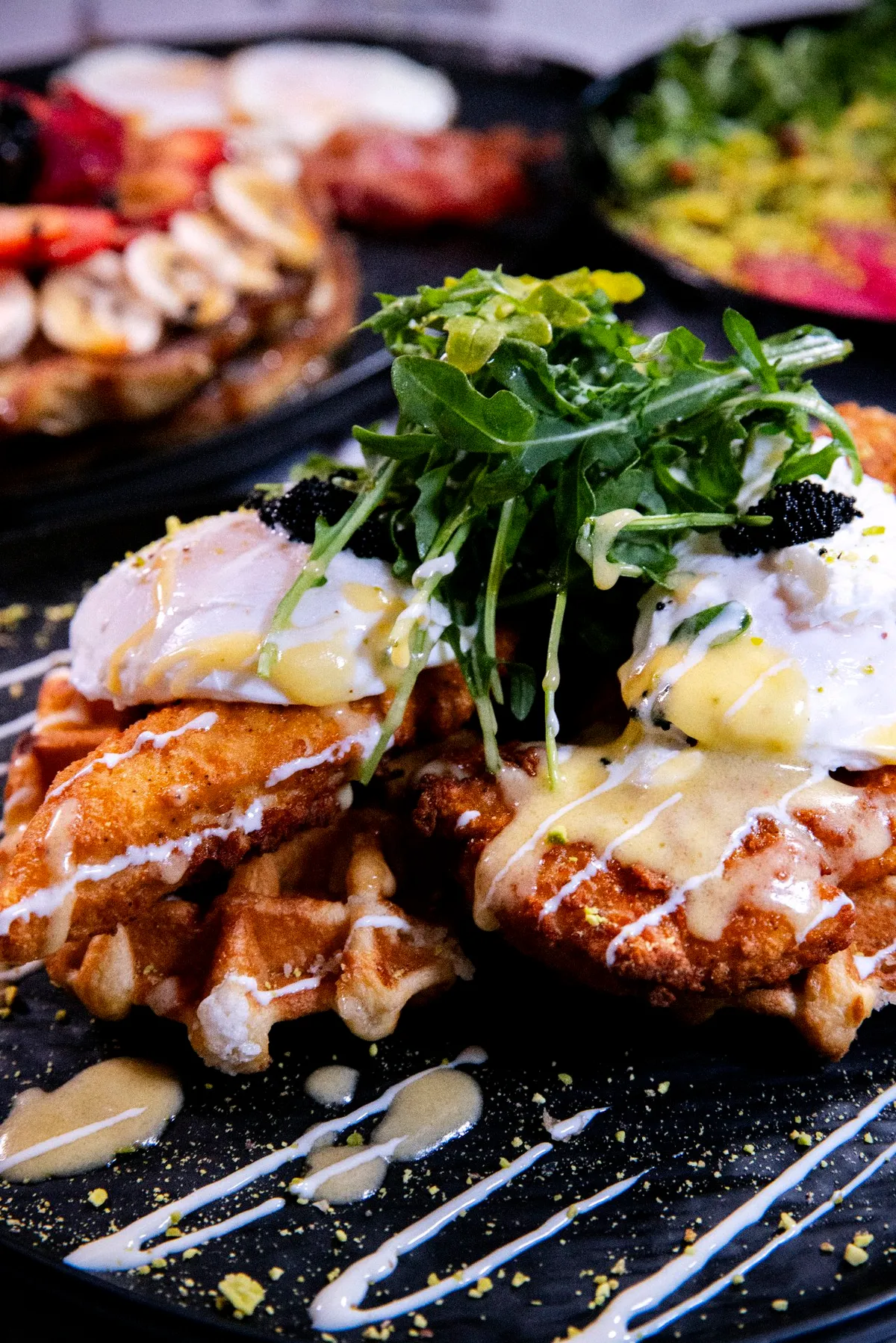 Japanese fried chicken and waffles with poached egg and hollandaise