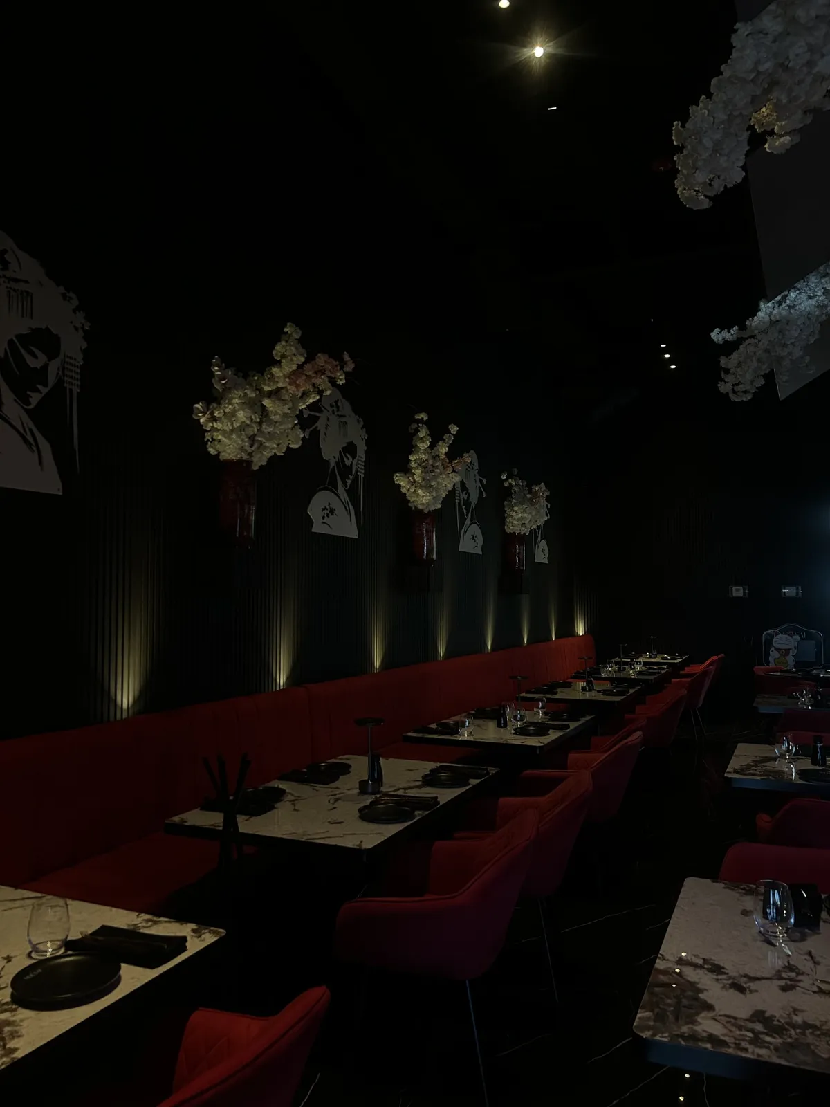 MOUSAI's private dining room with red velvet seating