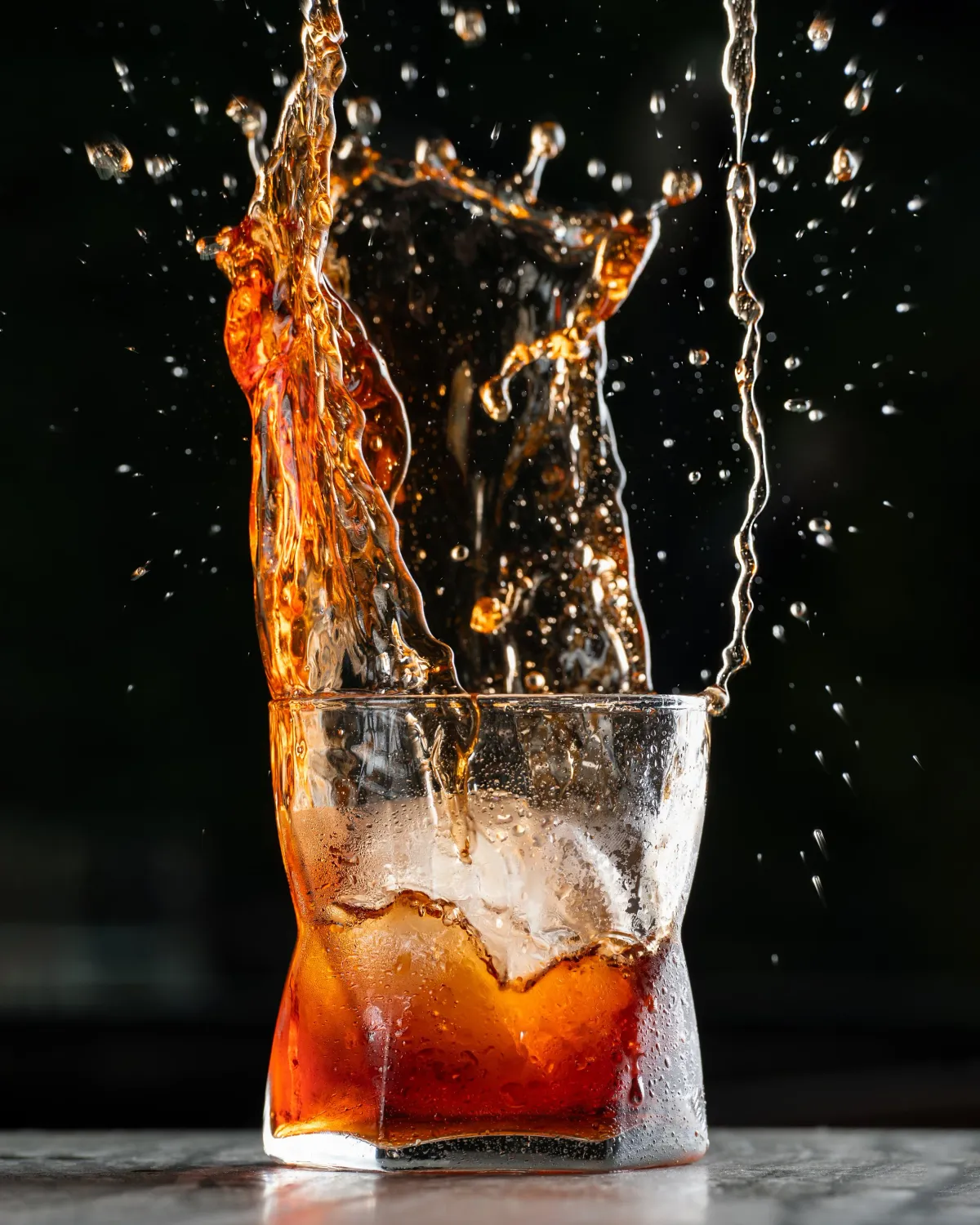 A carajillo poured over ice at the bar