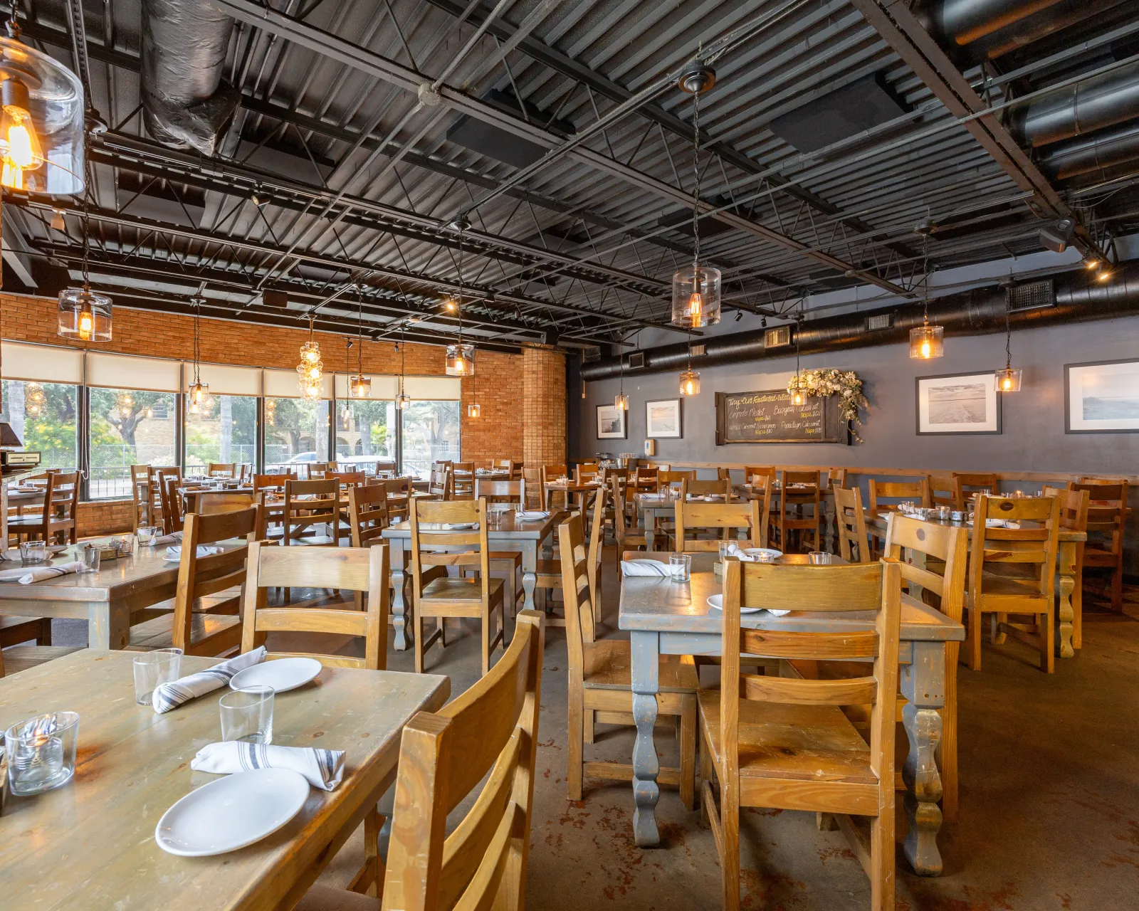 SALT's brick-walled dining room on North Main Street with its open kitchen at the back