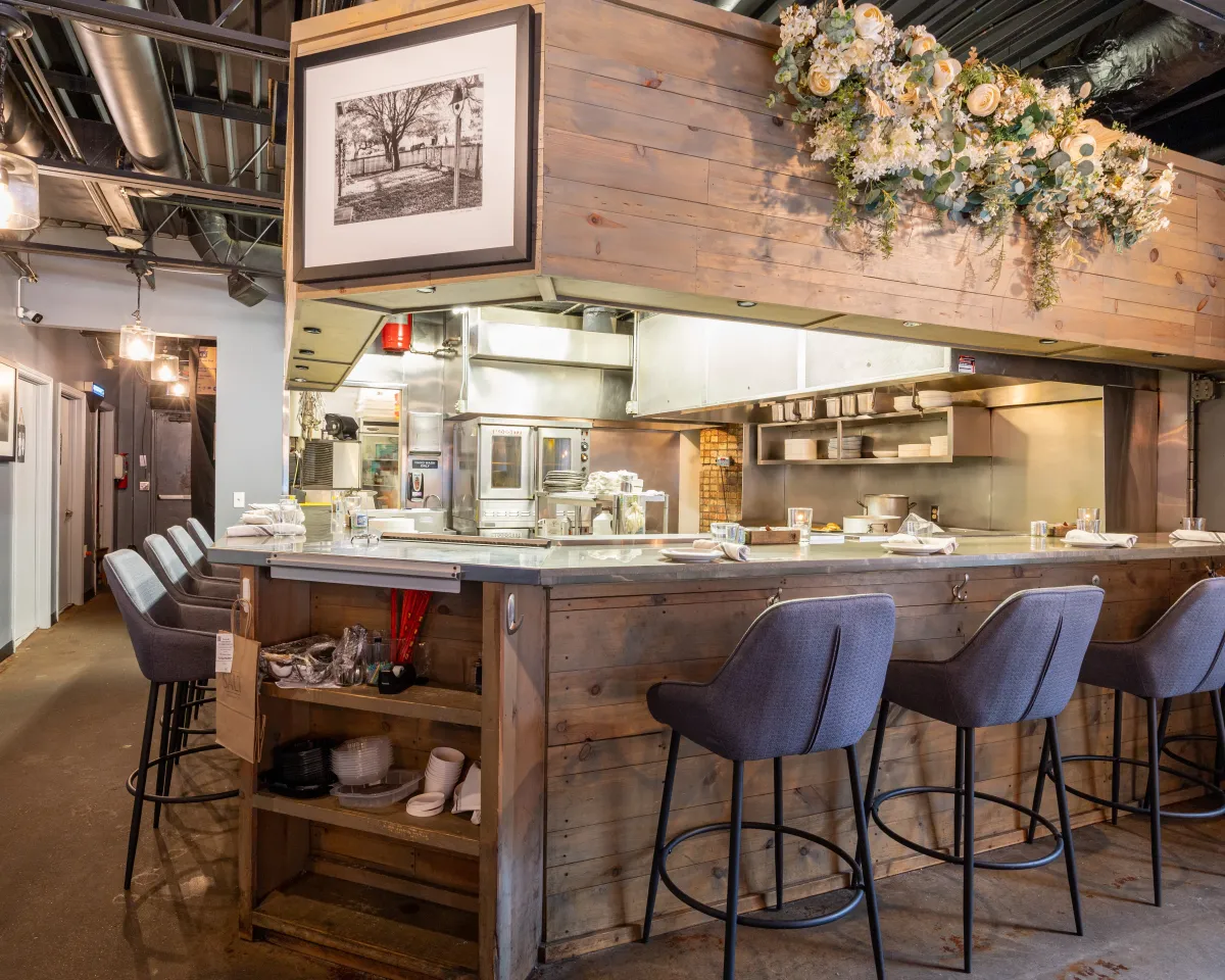 The Chef's Bar counter facing SALT's open kitchen