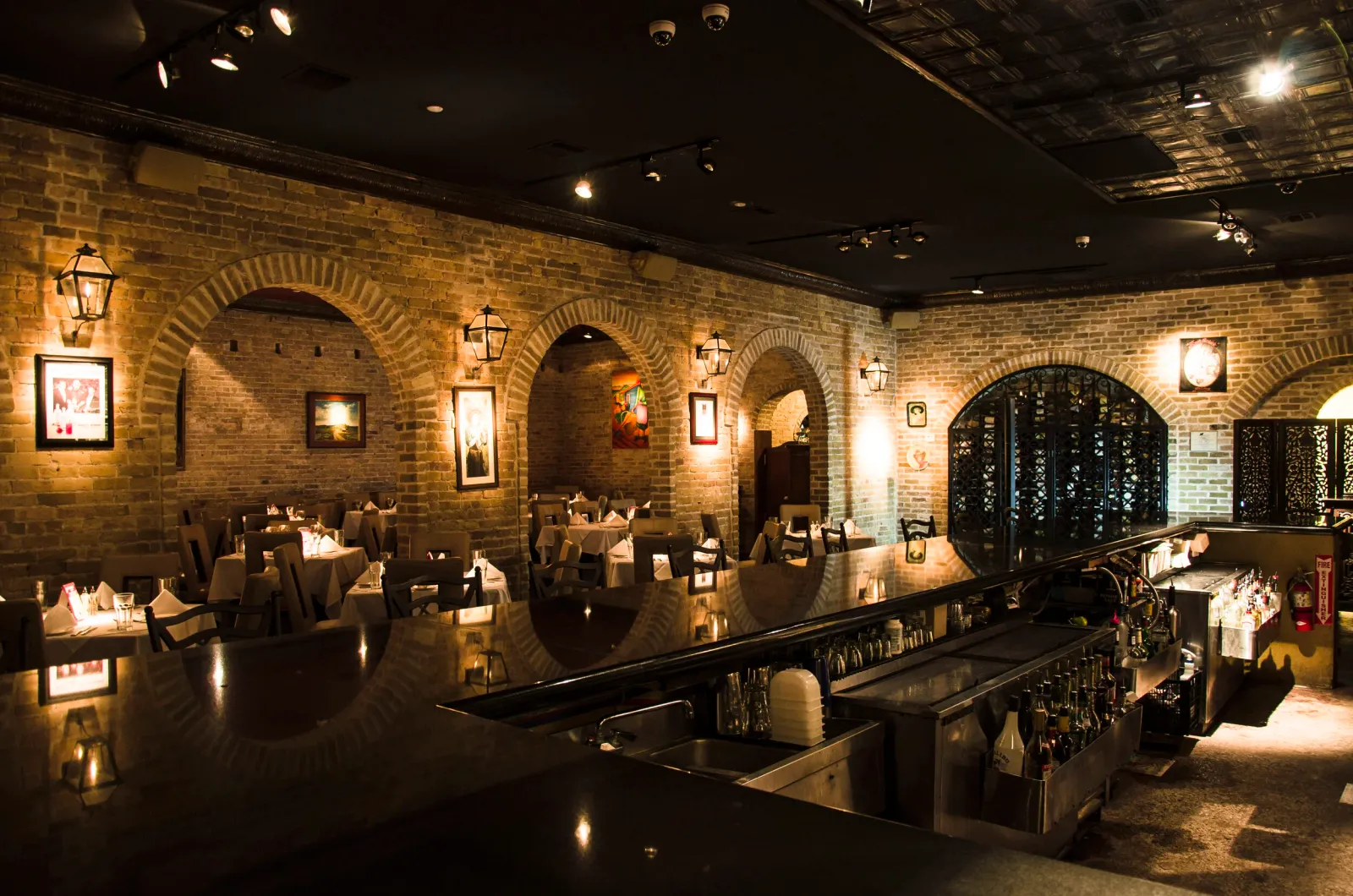 The Patio on Guerra's brick-arched dining room in downtown McAllen, lit low for dinner