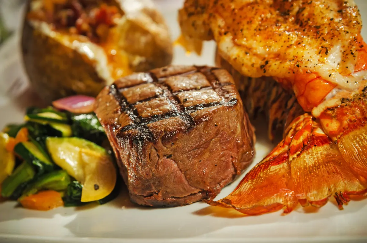 Grilled filet with a broiled lobster tail and twice-baked potato