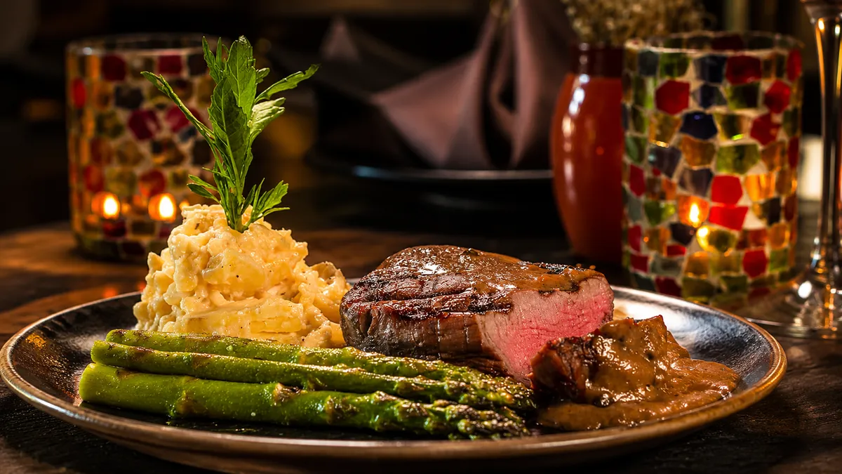 Texas filet in port mushroom sauce with asparagus and mashed potatoes